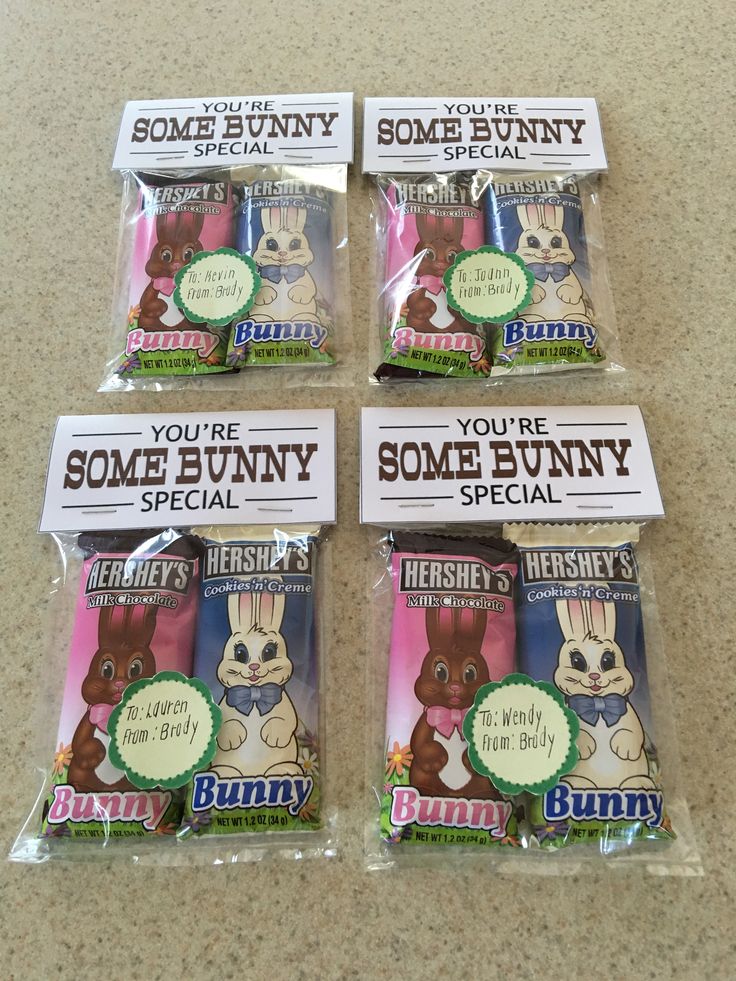 four bags of bunny candy sitting on top of a counter next to an envelope with the words, you're some bunny special