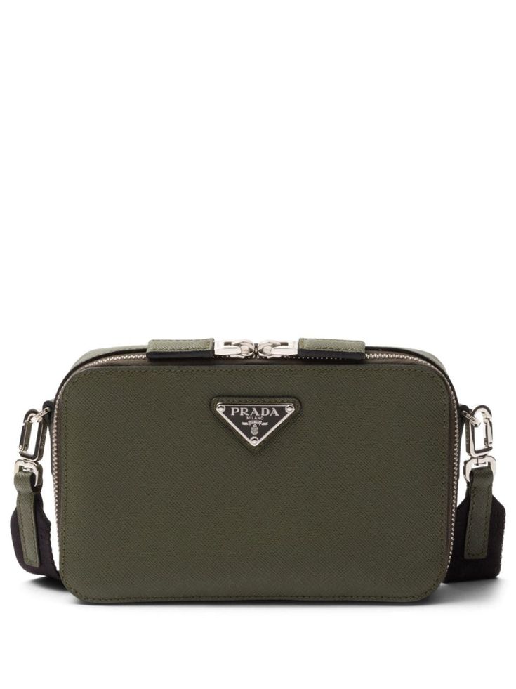 dark green Saffiano leather enamel triangle logo D-ring findings silver-tone hardware adjustable logo-jacquard shoulder strap two-way zip fastening main compartment internal patch pocket internal logo plaque Designer Green Shoulder Bag With Adjustable Strap, Designer Green Bags With Branded Hardware, Luxury Green Bag With Branded Hardware, Green Crossbody Bag With Logo, Green Crossbody Bag With Logo Strap, Triangle Logo, Green Bag, Patch Pocket, Dark Green