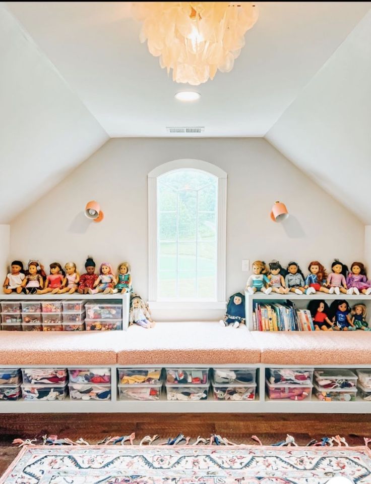 a room filled with lots of toys and stuffed animals on top of the windowsill