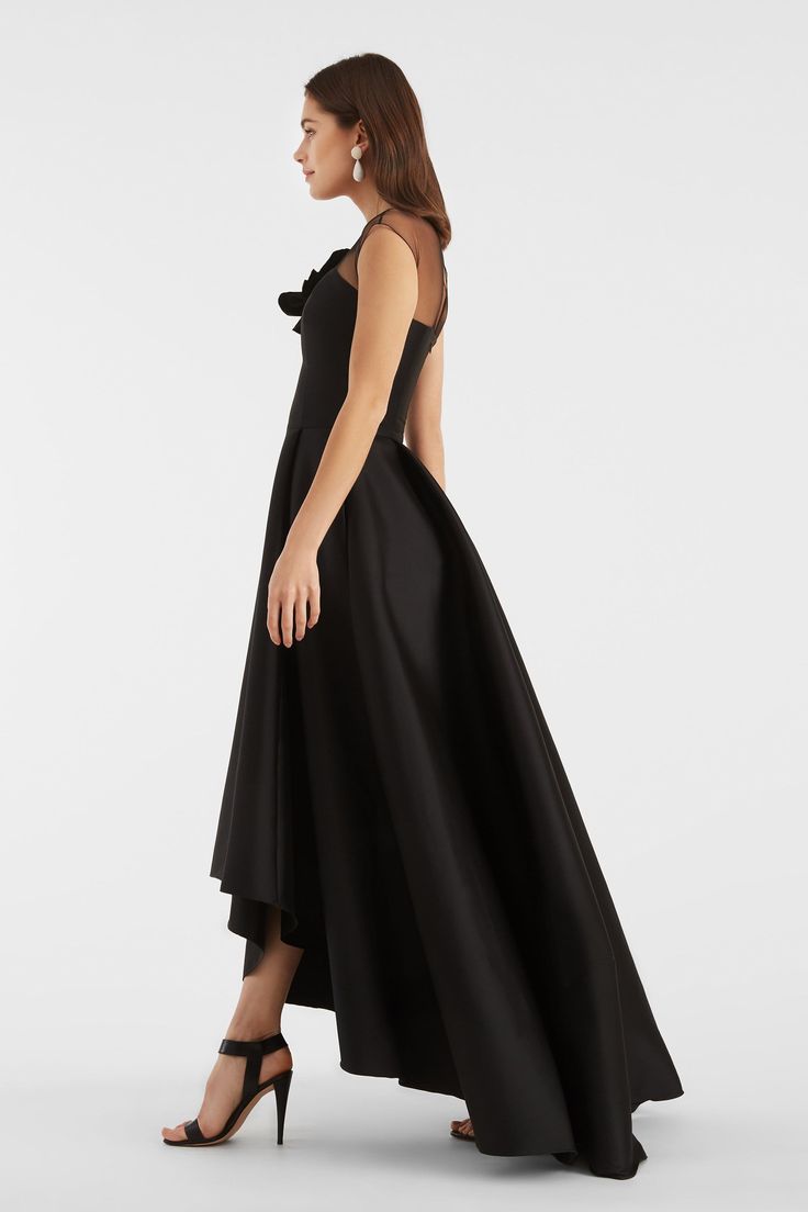 The Blakely gown in double stretch Mikado is both grand and elegant. Italian Lagattolla stretch-tulle at the neckline and cap sleeve is adorned with a Hibiscus flower featuring a picot edge detail. The hi-lo effect of the skirt allows for modesty, as well as a peek at your favorite evening shoe. Sachin and Babi believe in celebrating every day, dressing with joy, and creating clothes that inspire beauty and confidence. Here's to the moments we make, and the moments that make us. Cheers! Details: Sachin And Babi, Evening Shoe, Exclusive Gowns, Hibiscus Flower, Evening Shoes, Women Helping Women, Clothing Size Chart, Cap Sleeve, Hibiscus