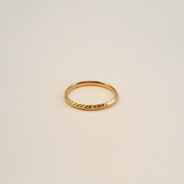 Material: Gold dipped with our signature 14k gold plating Sizes: 6, 7, 8 Made by hand in Southern California Dainty Gold Engraved Ring For Everyday, Gold Dainty Engraved Ring Tarnish Resistant, Dainty Gold Engraved Ring Tarnish Resistant, Dainty Gold Engraved Tarnish-resistant Ring, Everyday Engraved 14k Gold Ring, Gold Midi Rings Of Recycled Gold, Gold Plated Hoop Rings For Everyday, Minimalist Engraved Gold Ring In Recycled Gold, Adjustable Yellow Gold Rings For Everyday Use