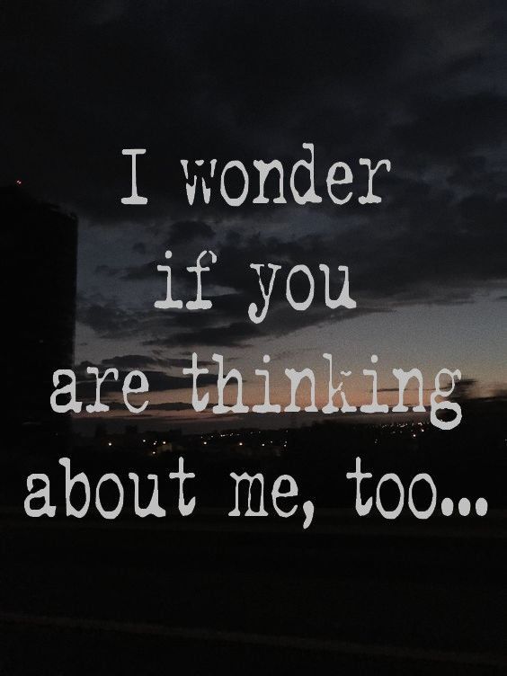 the words i wonder if you are thinking about me, too on a dark background