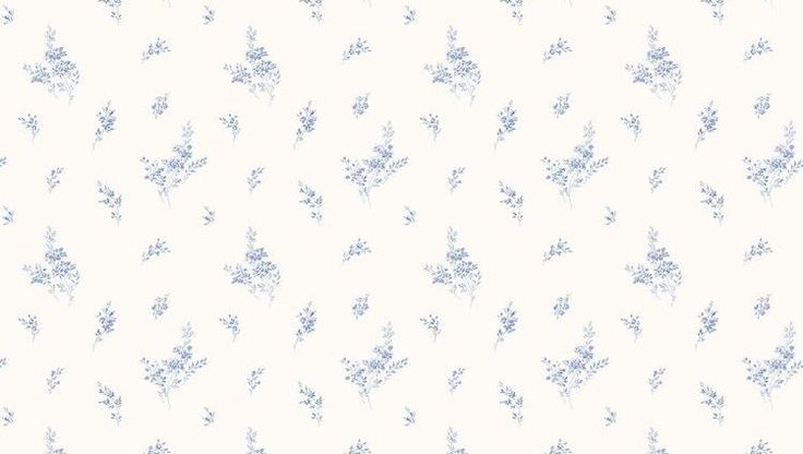 a white and blue floral wallpaper with small flowers on the bottom half of it