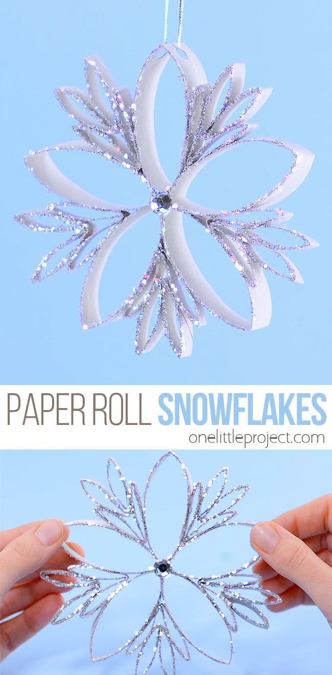 paper roll snowflakes are being held up by two hands, and then hanging from a string