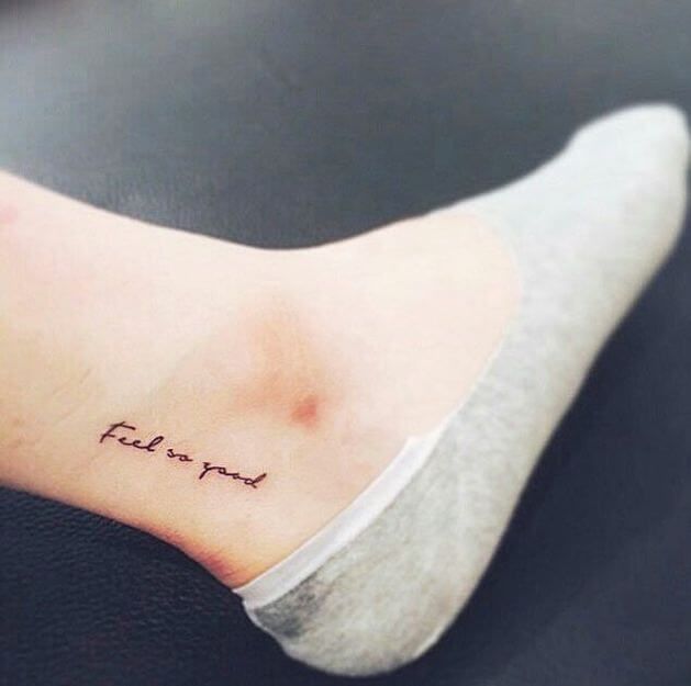 a woman's foot with the word fair and written in cursive font