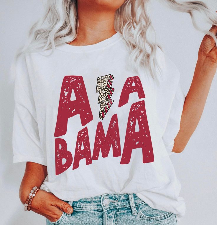 Alabama Shirt so perfect for Game Day and Football Season. Printed on Comfort Colors Tee. ****PLEASE NOTE**** This is a standard unisex size Comfort Colors Tee. For an oversized tee, size up. If you are looking for an oversized "T-shirt Dress" look, we recommend sizing up 2 sizes. See size chart for measurements. Comfort Colors® 1717 Medium fabric (6.1 oz/yd² (206.8 g/m²)) Relaxed fit Sewn-in twill label 100% ring-spun cotton ★ Care instructions: For long-lasting print results, wash inside out i Smiley Face Shirts, Alabama Shirt, Alabama Shirts, Alabama Fans, Cool Graphic Tees, Fashion Inspiration Design, Roll Tide, Comfort Colors Tee, Crimson Tide