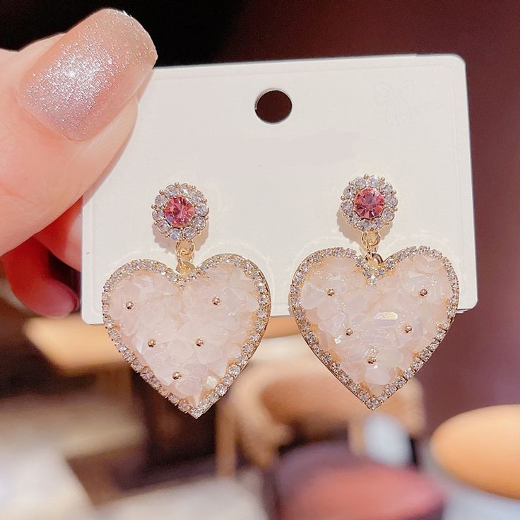 earring type: earringsShape\Pattern: HeartMaterial: Zinc AlloyGender: Female Pink Heart Cut Earrings For Party, Pink Heart Crystal Earrings For Valentine's Day, Pink Dangle Heart Earring, Pink Heart-shaped Crystal Earrings For Valentine's Day, Pink Crystal Earrings For Valentine's Day, Rose Gold Heart Earrings, Trendy Heart Drop Earrings For Wedding, Elegant Pink Heart-shaped Earrings, Trendy Wedding Heart Drop Earrings