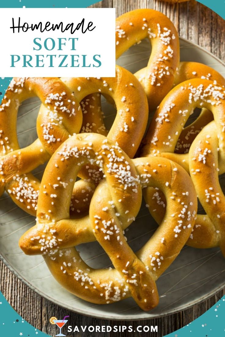 soft pretzels on a white plate with salt sprinkled in the middle