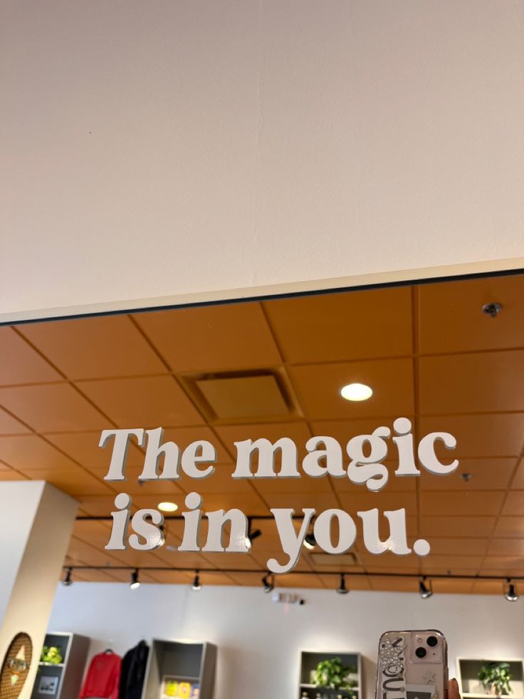 there is a sign that says the magic is in you