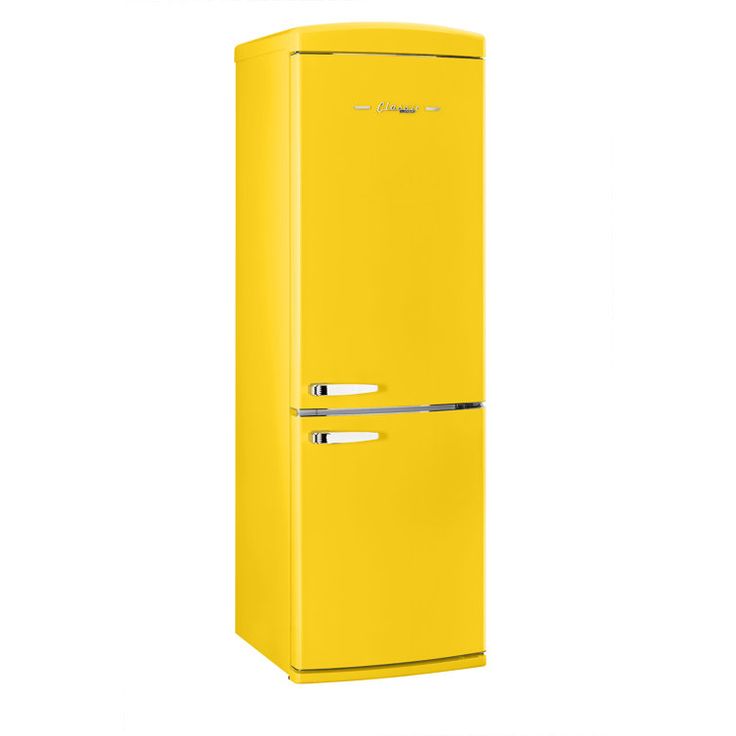 a yellow refrigerator freezer sitting on top of a white floor next to a wall