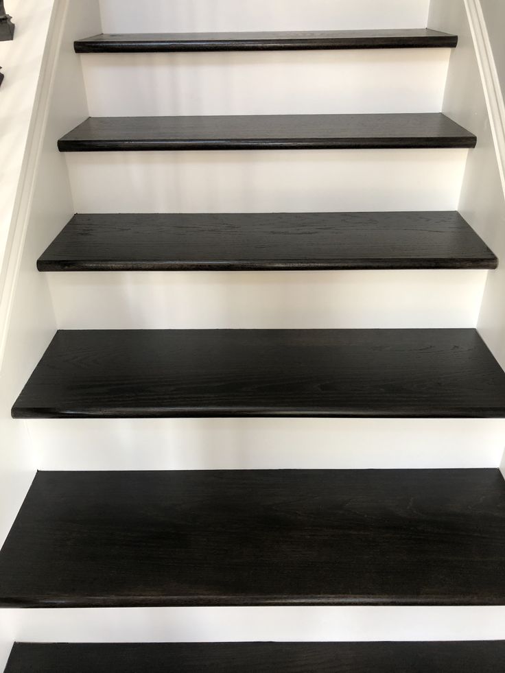 some black and white stairs in a house