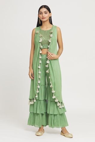 Green cape featuring tassel embellishments, paired with a sequin embroidered inner blouse and tiered palazzo. The set is crafted from art georgette fabric for a lightweight feel., Fit: Relaxed Layered Kurta, Sequin Art, Crop Top Set, Palazzo Set, Draped Skirt, Sharara Set, Brown Silk, Women Kurta, Silk Jacket