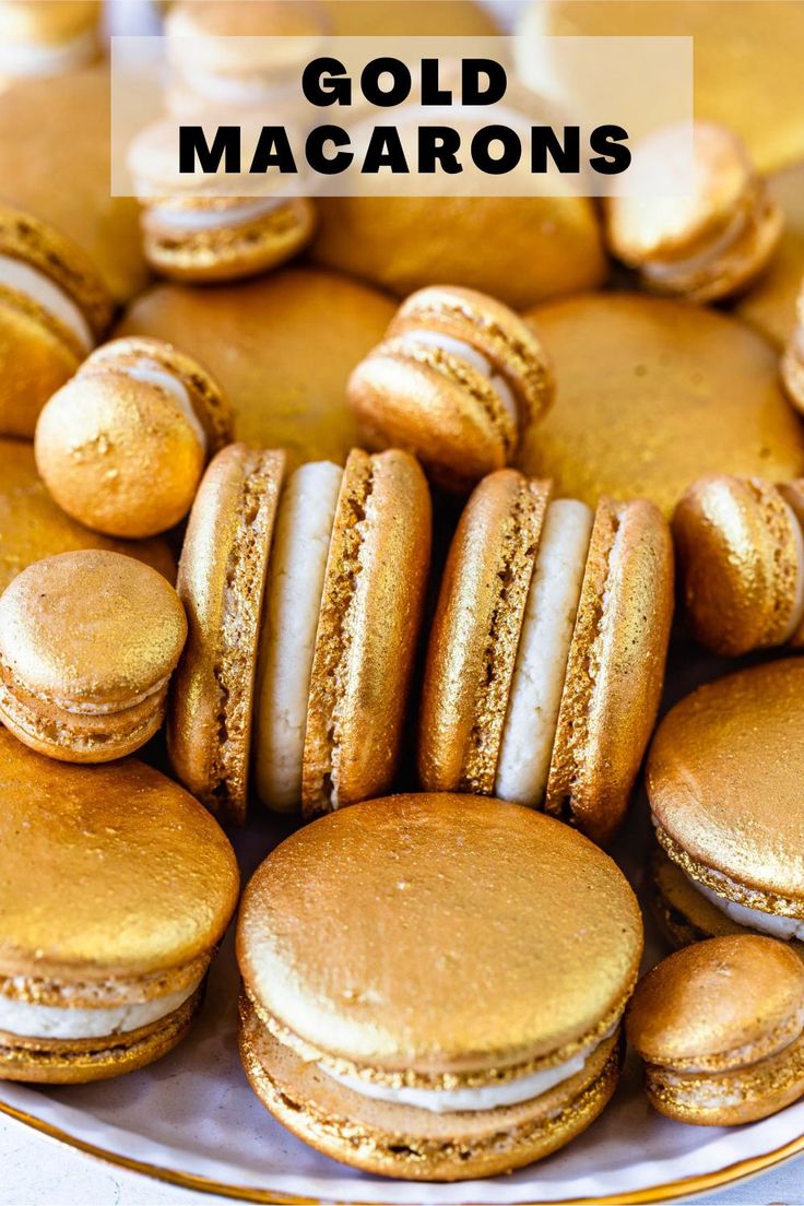 there are many cookies and macaroons on the plate, but one is gold