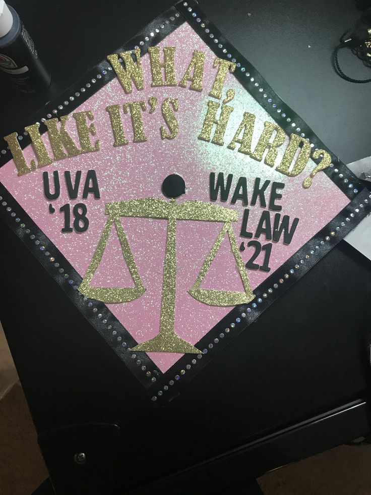 a pink and gold graduation cap that says, what it's hard?