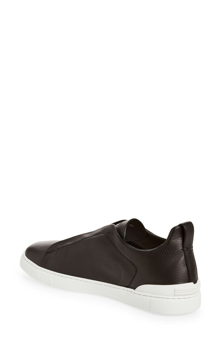 The Secondskin Triple Stitch sneaker features a glove-leather upper for mold-to-your-foot comfort and is mounted on an extralight rubber sole for a sleek look. The brand’s signature crossover elastic straps ensure an easy slip-on fit. Pull-on style with elastic laces Leather upper and lining/rubber sole Made in Italy Designer Shoes Sporty Leather Slip-on Sneakers With Contrast Sole, Modern Slip-on Sneakers In Calf Leather, Functional Leather Slip-on Sneakers, Functional Leather Slip-on Sneakers With Round Toe, Functional Leather Low-top Slip-on Sneakers, Calf Leather Slip-on Sneakers With Contrast Sole, Functional Low-top Leather Slip-on Sneakers, Slip-on Calf Leather Sneakers With Contrast Sole, Leather Slip-on Sneakers With Round Toe