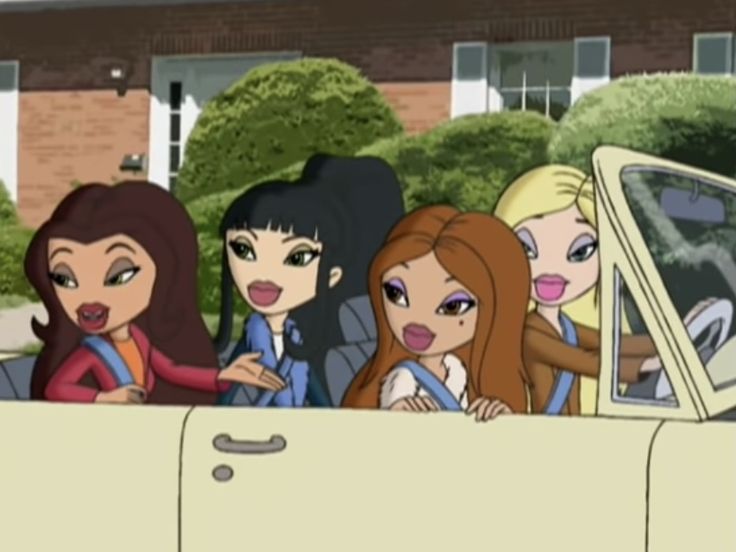 the girls are riding in the car together