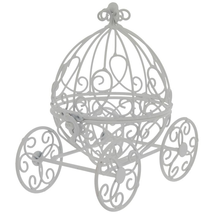 a white metal carriage with wheels and hearts on the front is hanging from a chain