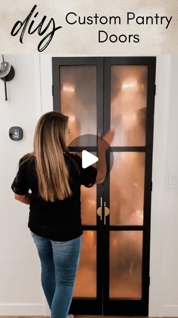 a woman standing in front of a door with the words diy custom pantry doors