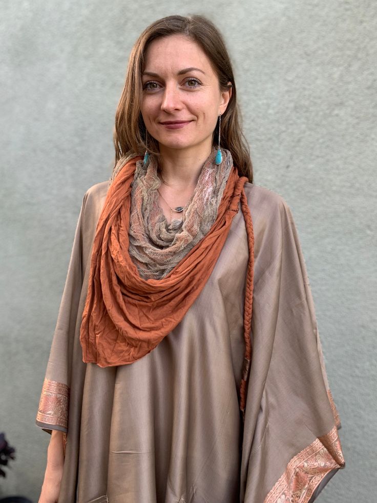 This beautiful desert shawl is a one of the kind creation. It can be worn as a headpiece, a belt, a scarf or a wrap. It comes with two detachable layers: a gauze cotton, hand-dyed by Lunara Love herself, and a stretch cotton jersey layer. This gorgeous beduin style desert scarf is lovingly hand crafted by Lunara Love of Lunara Design for our collaborative collection "Nomad Life" Being a nomad is like being a free spirit, a desert dweller who is ready to let go of the things that don't really mat Bohemian Shawl Scarf With Natural Dye, Bohemian Shawl Scarves With Natural Dye, Bohemian Hand Dyed Scarves For Summer, Bohemian Hand-dyed Scarves For Summer, Bohemian Silk Scarf, Bohemian Sheer Dupatta Shawl, Bohemian Style One Size Scarf Wrap, Bohemian Shawl For Layering, Bohemian One Size Scarf Wrap