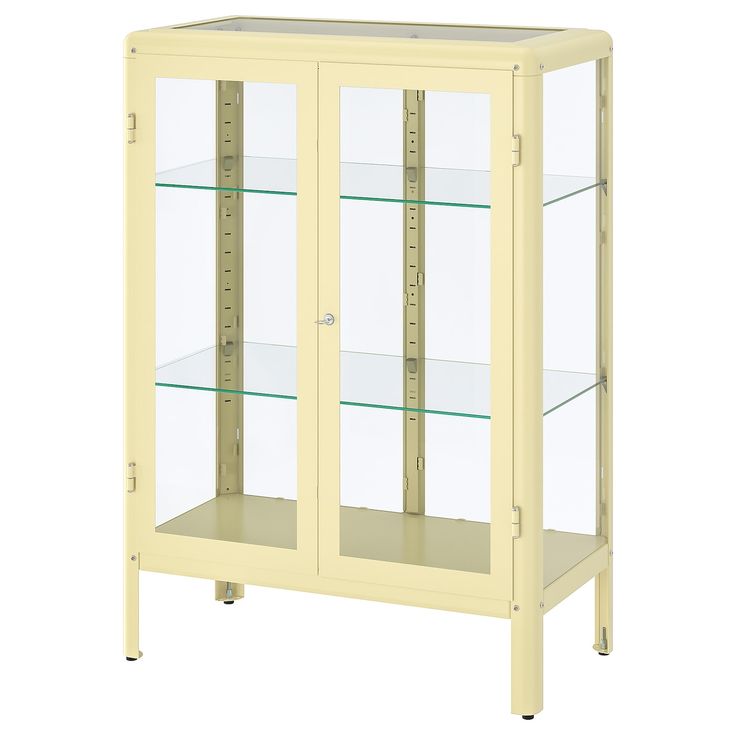 a yellow display cabinet with glass doors and shelves on the bottom, side by side