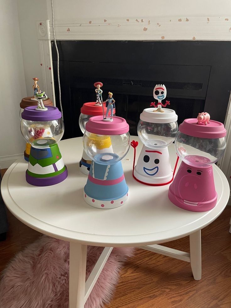 a white table topped with lots of toys