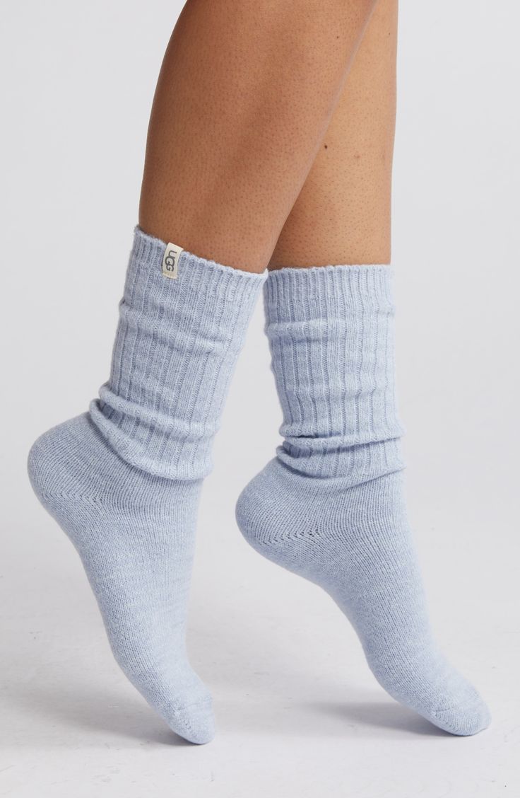 These soft, stretchy ribbed socks have a cozy slouchy fit through the ankles and reinforced heels and toes for durability. 99% polyester, 1% elastane Machine wash, tumble dry Imported Comfortable Warm Solid Color Socks, Casual Super Soft Cozy Fit Socks, Warm Comfortable Plain Color Socks, Casual Cozy Fit Super Soft Socks, Warm Snug Solid Socks, Soft Fitted Cozy Socks, Casual Ribbed Round Toe Socks, Casual Mid-calf Ribbed Socks, Comfortable Super Soft Solid Socks