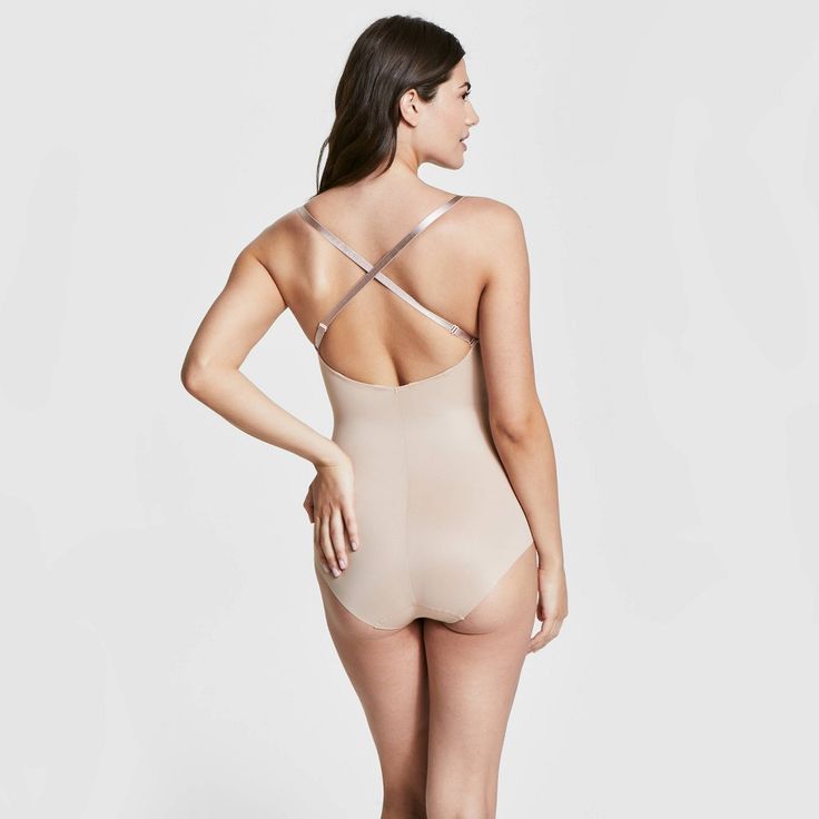 This versatile bodysuit is the ultimate solution for low-back dresses! The flawless-finish fabric is lightweight, cling-free, and offers 360 degrees of comfortable, single-layer shaping for a sleek, all-over feel. And, best of all? The innovative design features lightly padded, fit-flexible wireless cups and adjustable, convertible straps for a variety of styling options Sculpting Backless Swimwear With Built-in Bra, Stretch Backless Bodysuit With Built-in Bra, Shapewear Leotard With Built-in Bra, Fitted Backless Leotard With Built-in Bra, Seamless Shaping Shapewear With Low Back, Seamless Low Back Shaping Shapewear, Low Back Seamless Shaping Shapewear, Shaping Shapewear With Built-in Bra And Low Back, Shaping Backless Bodysuit With Built-in Bra