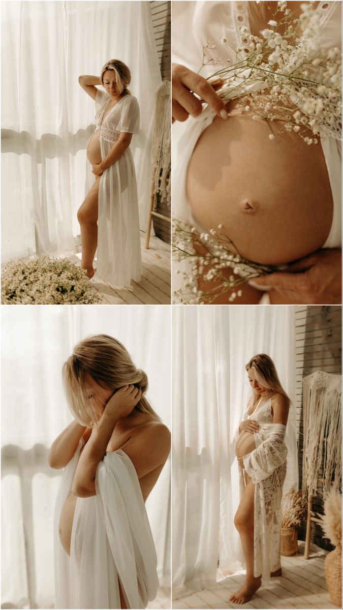 the pregnant woman is posing in her white dress and holding her belly up to her chest