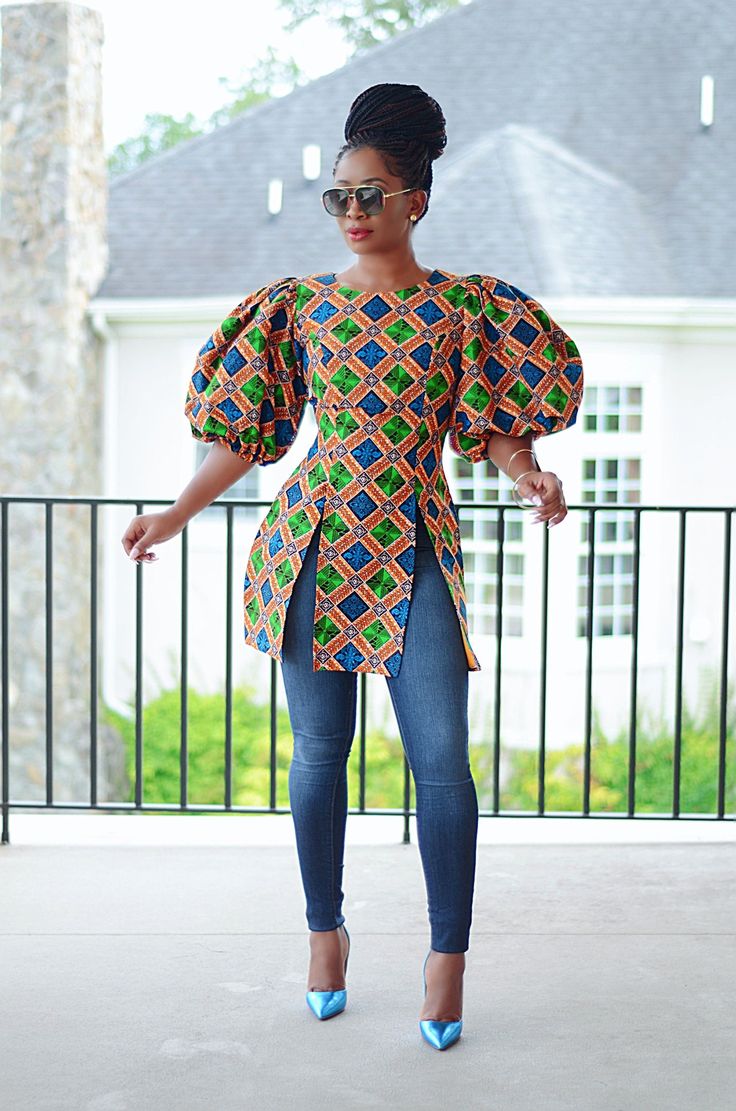 FINAL SALE/ NO RETURNS Beautiful Ankara print Top Statement puff sleeve (See Video) Fabric is 100% cotton with no stretch. Zipper in the back.  *Authentic African fabric. Hand Made. Gold belt in video Not Included *Please note that pattern placement may    vary slightly with each piece. *Color may vary slightly due to lighting . Model is 5'5 and is wearing a Small. Size up if you fall in between sizes. Size Chart XS: US 2 (Bust 32, Waist 25, Hip 34)  Small: US 4/6 (Bust 36, Waist 28, Hip 38) Med Casual Ankara Blouses For Women, Ankara Puff Sleeve Top, Ankara Tops Blouses With Jeans Classy, African Design Tops, Fitted Multicolor Blouse With Balloon Sleeves, Multicolor Fitted Blouse With Balloon Sleeves, Fitted Multicolor Balloon Sleeve Blouse, Multicolor Cotton Puff Sleeve Top, Multicolor Fitted Blouse With Puff Sleeves