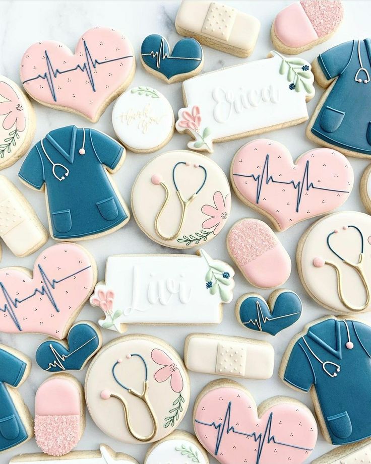 cookies decorated to look like doctors and nurse's uniforms