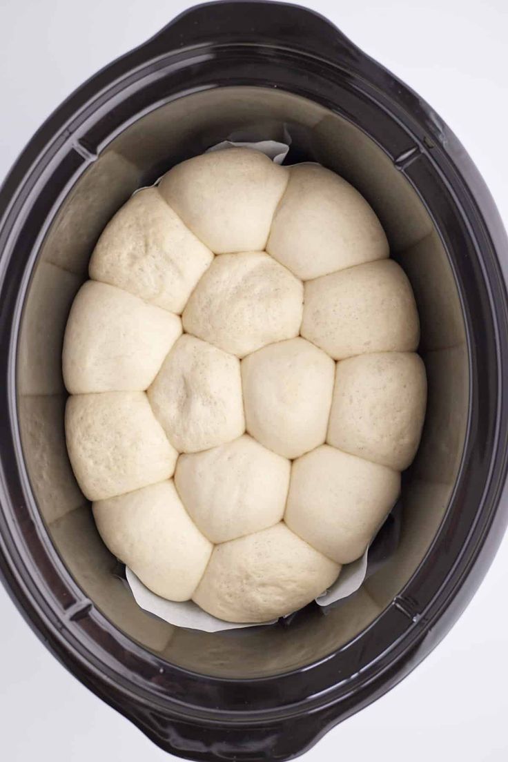 the inside of an instant pot filled with dough