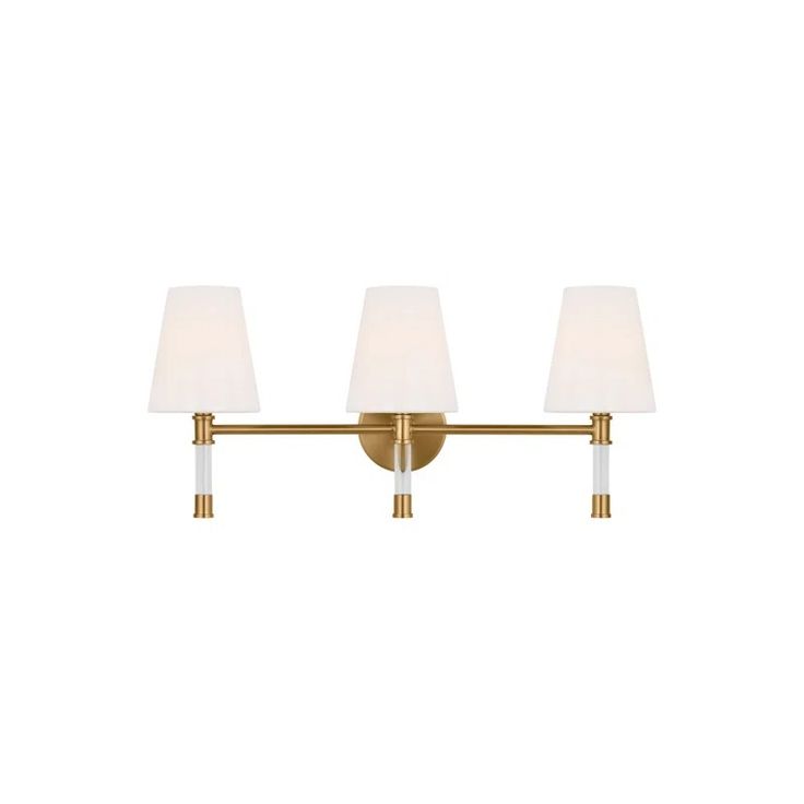 three light brass bathroom fixture with white shades