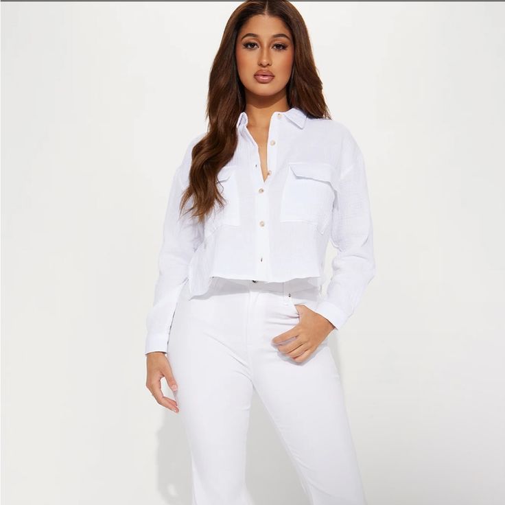 Super Sexy Size Medium White Button Up Tee New With Tags Fitted White Cropped Shirt With Buttons, White Button-up Cropped Shirt For Fall, White Button-up Cropped Shirt, Trendy Long Sleeve Cropped Shirt With Button Closure, Trendy Long-sleeved Cropped Shirt With Button Closure, White Long Sleeve Cropped Shirt With Button Closure, Trendy Long Sleeve Crop Top With Button Closure, Chic White Collared Cropped Shirt, Chic Fitted Tops With Buttoned Pockets