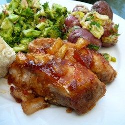 a white plate topped with meat and veggies