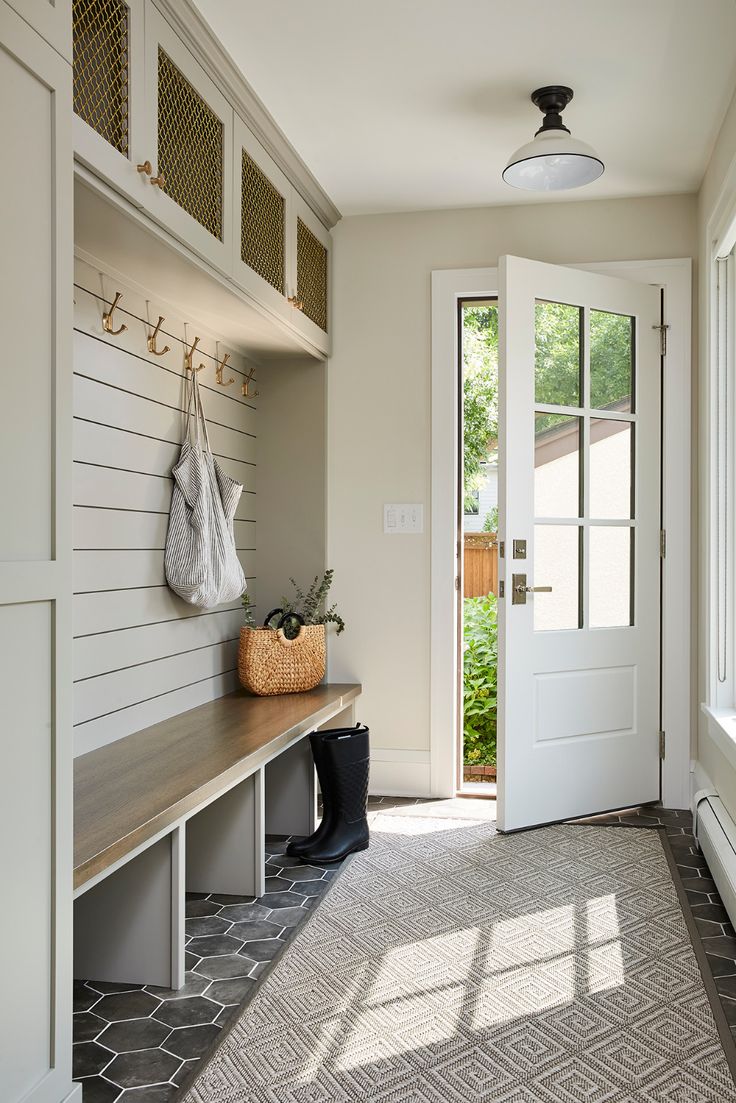 the entryway is clean and ready for us to use as a storage area in the house