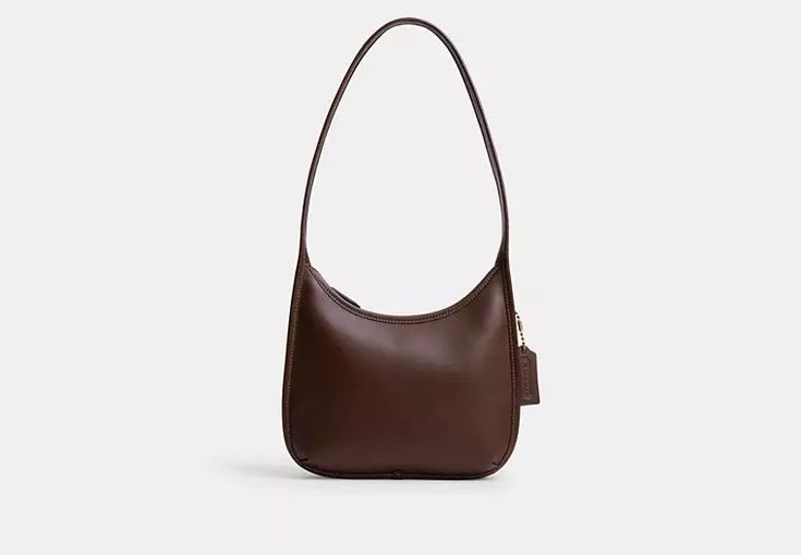 COACH® | Curve Zip Bag Coach Edie Shoulder Bag, Vintage Coach Bags, Backpack Charm, Hobo Style, Large Wallet, Our Legacy, Essential Bag, Zipped Bag, Vintage Coach