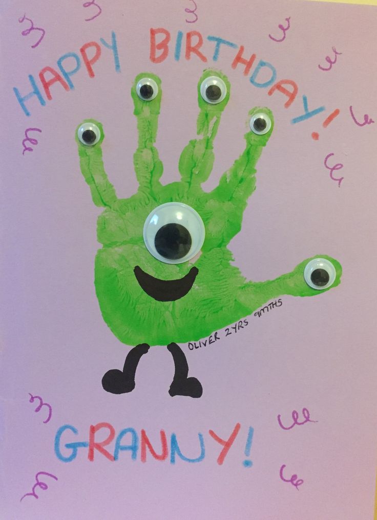 a green handprint with googly eyes and the words happy birthday granny on it