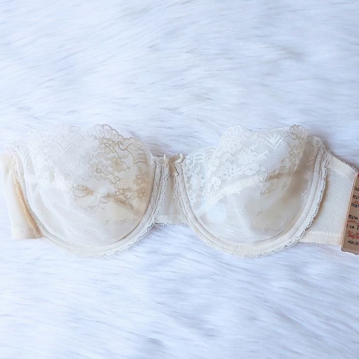 Vanity Fair Vintage Lace Unlined Strapless Bra Rare! New Old Stock, Vintage, Likely 90s (Possibly 80s?) Floral Lace Strapless Bra By Vanity Fair. Beautifully Made, Breathable Mesh Band And Mesh-Lined Cups For Extra Re-Enforcement. 2-Part, Unlined Cups With Bridal-Esque Lace And Center Satin Bow. Ivory/ Off-White. Size: 36b (Sister Size: 34c) New With Tags. Bridal Retro 1990s 1980's 1990's 80's 90's Classic Lingerie French Aesthetic American Design Brassiere Nostalgic Nostalgia Pin-Up Lacy Embroi Elegant Strapless Bra For Spring, White Strapless Bra For Summer, Classic Fitted Spring Bra, Fitted Bra For Spring Wedding, Classic Fitted Bra For Spring, Fitted Bra For Wedding In Spring, Cream Fitted Bra For Spring, Fitted Wedding Bra For Spring, Spring Wedding Fitted Bra