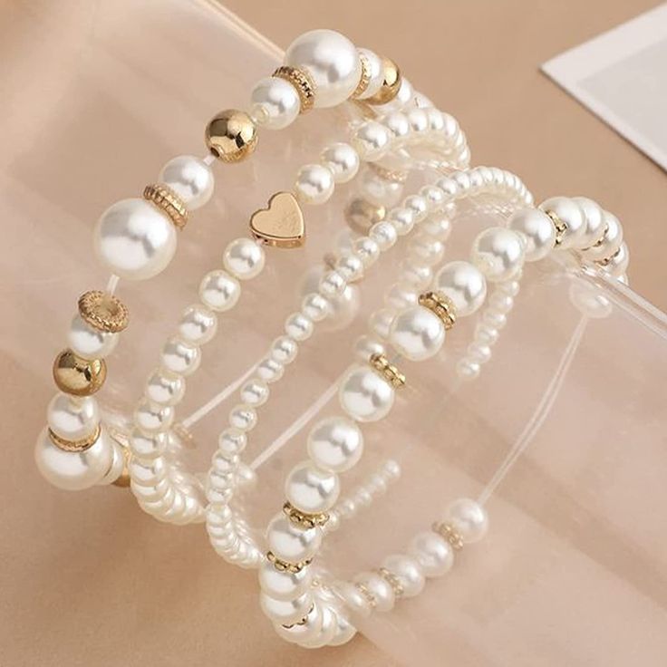 【Satin White Pearls Beads】Round pearls for jewelry making with satin white color that is perfect for making jewelry and decorations, being great to be vase filler and daily personal ornaments. White loose pearls allow matching universal jewelry charms, like tassels, various pendants, colored beads etc. 【Wide Application】Stain white pearl beads for jewelry making can help you create a variety jewelry, such as chokers, bracelets, earrings, necklaces or earrings and DIY crafting. Product Informatio خواتم خطوبة, قلادات متدلية, Faux Pearl Bracelet, Diy Bracelet Designs, Beads Bracelet Design, Handmade Jewelry Tutorials, Jewelry Accessories Ideas, Beaded Bracelets Diy, Bracelets Handmade Beaded