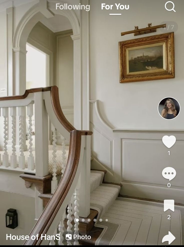 the stairs are white and have pictures on them