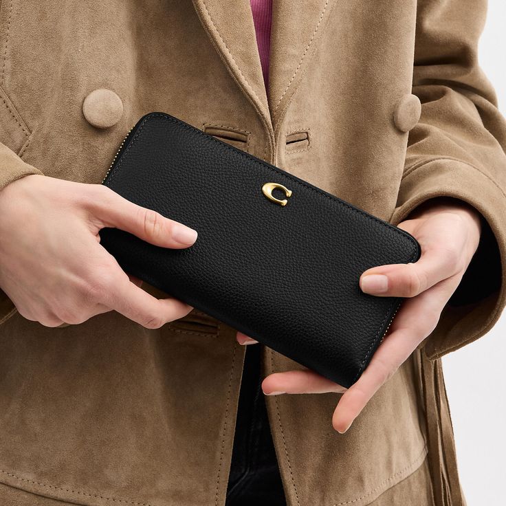 Crafted of polished pebble leather detailed with our Signature hardware this expandable design unzips to reveal a spacious interior. It holds an iPhone X and features 12 card slots two full-length bill compartments and a coin purse to keep essentials organized. | Coach Essential Accordion Zip Wallet - Women's - Brass/black Coach Black Rectangular Trifold Wallet, Coach Black Leather Wallet, Black Coach Wallet With Detachable Strap, Luxury Black Coach Wallet, Coach Wallet With Zipper Closure For On-the-go, Polished Pebble, Large Wallet, I Phone, Signature Hardware