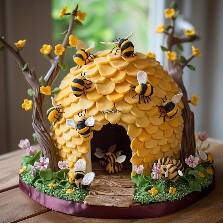 a cake made to look like a beehive with honeybees on it