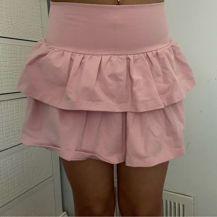 Super Cute And Brand New. Only Tried On. No Shorts Under. Casual Tiered Skirt With Built-in Shorts, Casual Skirted Bottoms With Built-in Shorts, Solid Color Tiered Skirt For Day Out, Solid Color Mini Ruffled Skirt, Day Out Skirt With Built-in Shorts, Skirt Bottoms With Built-in Shorts For Day Out, Skirt With Built-in Shorts For Day Out, Short Ruffled Skirt Bottoms, Chic Bottoms With Built-in Shorts And Tiered Skirt