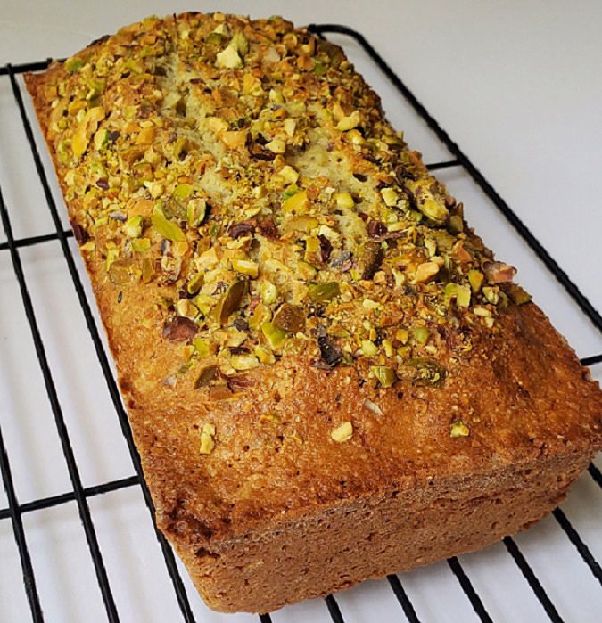 a loaf of bread sitting on top of a cooling rack