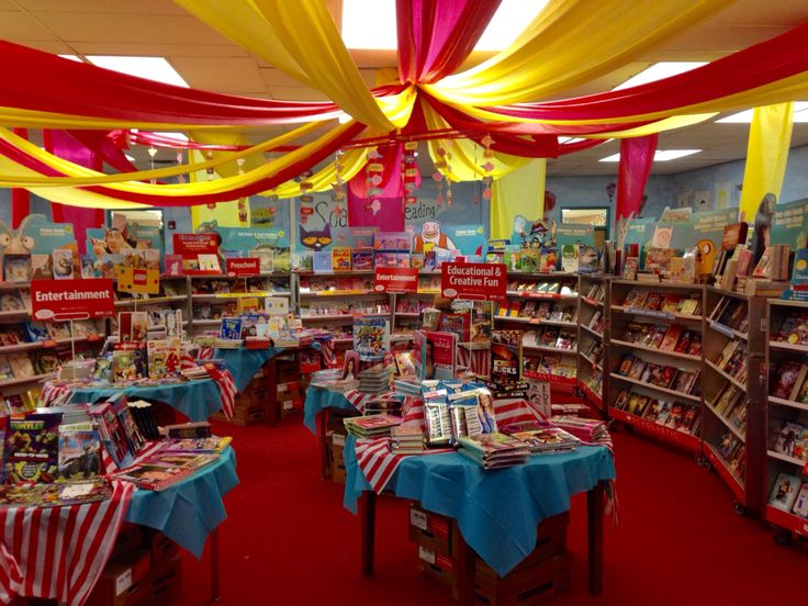 the children's book store is decorated with red, white and blue drapes