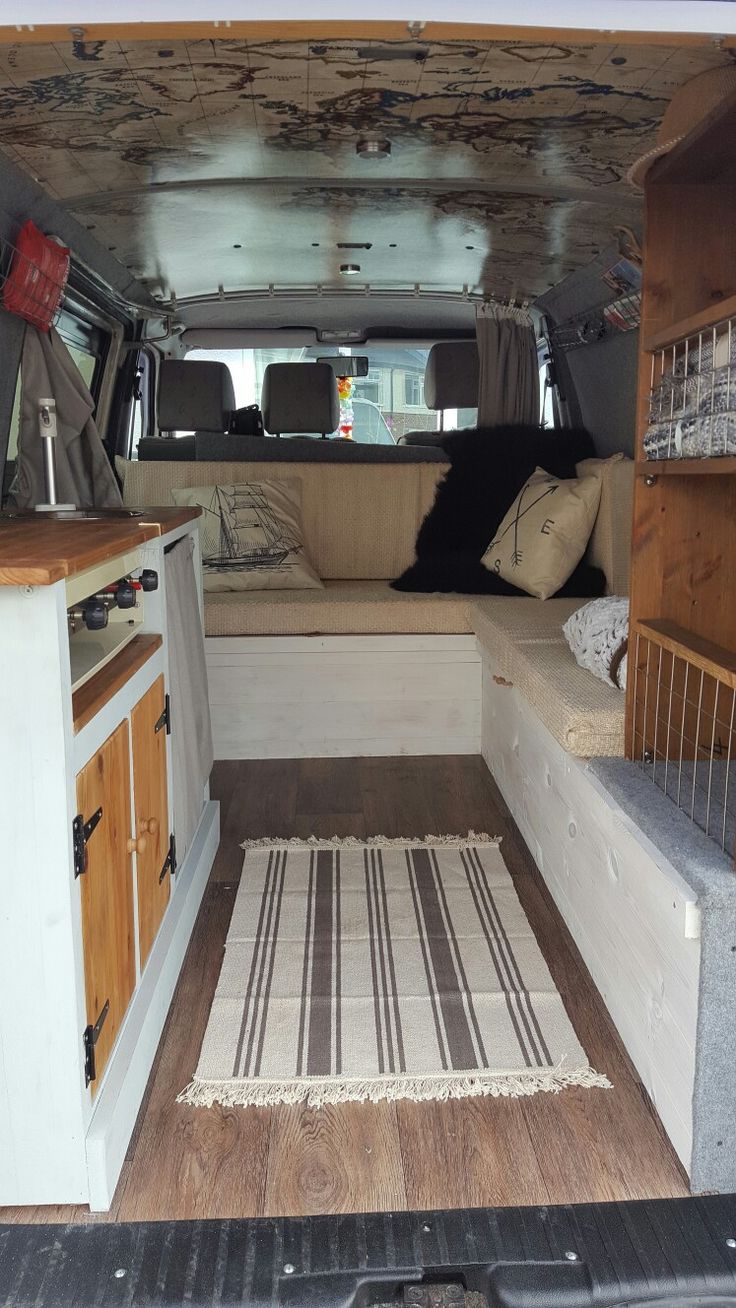 the interior of an rv with wood flooring