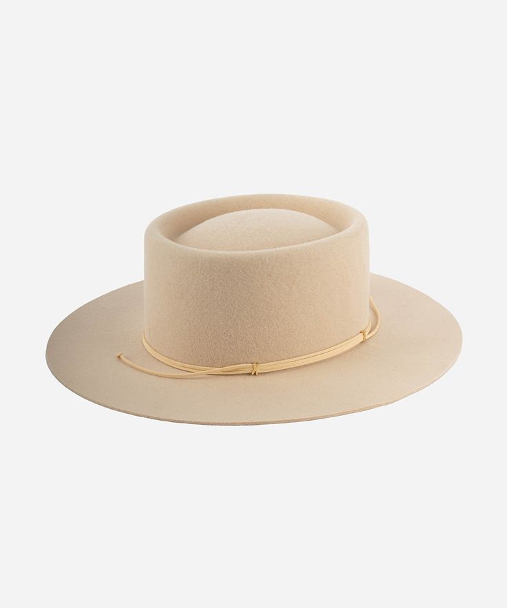 The Maise features a telescope crown + flat brim, an ideal combination of shapes to complete any outfit. With a brim that is neither too short or too wide, the Maise flawlessly frames every face. This hat includes an adjustable, layered leather band with our signature xx and temperature regulating wool felt to keep you comfortable all season. Modern Adjustable Panama Hat With Curved Brim, Modern Wide Brim Hat For Everyday, Modern Panama Hat With Adjustable Curved Brim, Modern Adjustable Fedora, Adjustable Flat Crown Top Hat For Fall, Classic Adjustable Top Hat With Flat Crown, Adjustable Flat Brim Boater Hat For Fall, Fall Adjustable Flat Brim Boater Hat, Fall Adjustable Boater Hat With Flat Brim