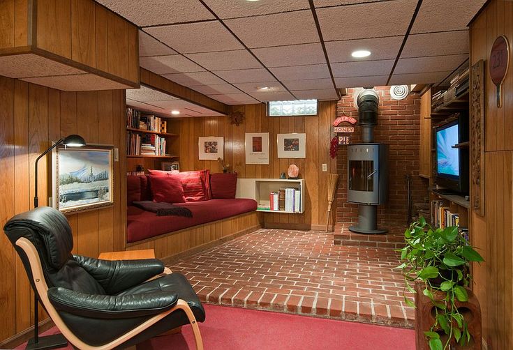 a living room filled with furniture and a flat screen tv