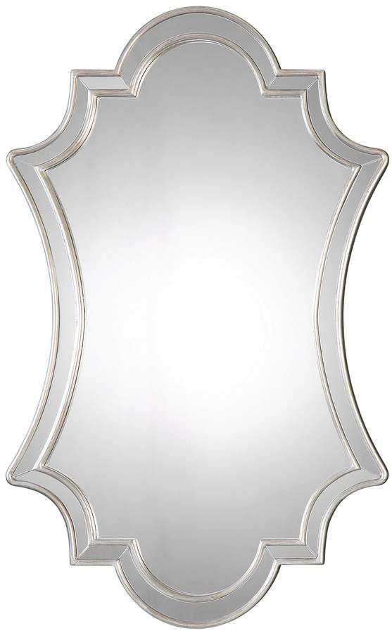 a large silver mirror with an ornate frame on the front and back side, against a white background