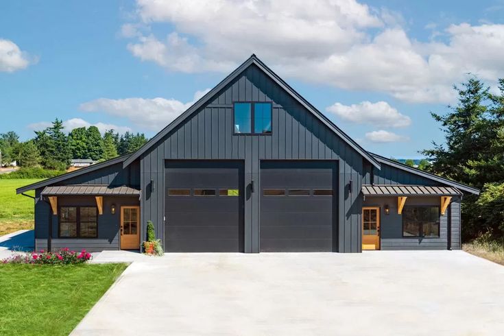 a house with two garages on the side of it